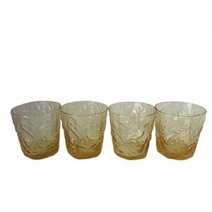 Set of four vintage amber textured crinkle glasses.